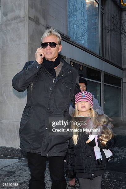 Actor Dolph Lundgren and his daughter Greta Eveline Lundgren walk on Madison Avenue December 24, 2009 in New York City.