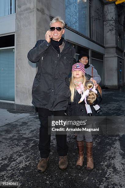 Actor Dolph Lundgren and his daughter Greta Eveline Lundgren walk on Madison Avenue December 24, 2009 in New York City.
