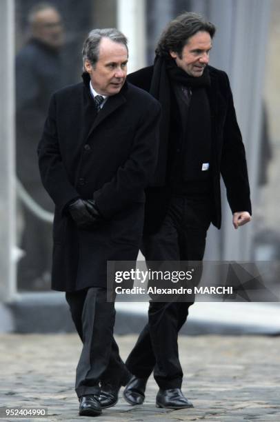 Dominique Paille and Frederic Lefebvre arrive for the funeral of French politician, Philippe Seguin, at the Saint-Louis-des-Invalides Church in Paris.