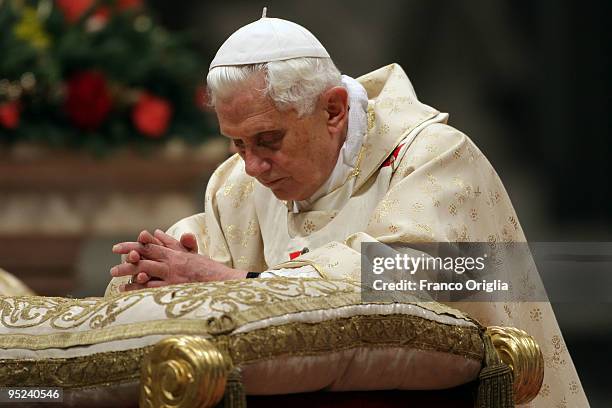 Pope Benedict XVI gives Christmas Night Mass at St. Peter's Basilica on December 24, 2009 in Vatican City, Vatican. The mass on Christmas Eve and...