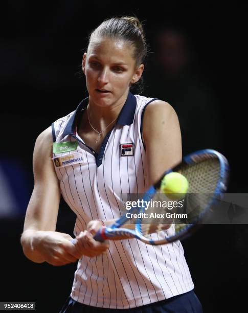 Karolina Pliskova of Czech Republic plays a backhand to Anett Kontaveit of Estonia during day 6 of the Porsche Tennis Grand Prix at Porsche-Arena on...