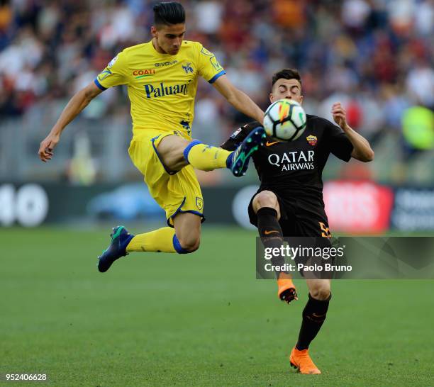 Stefan El Shaarawy of AS Roma competes for the ball with Fabio DePaoli of AC Chievo Verona during the serie A match between AS Roma and AC Chievo...