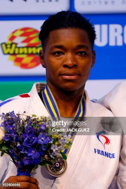 France's silver medallist Audrey Tcheumeo poses on the podium with her medal after the women's under 78 kg weight category competition during the...