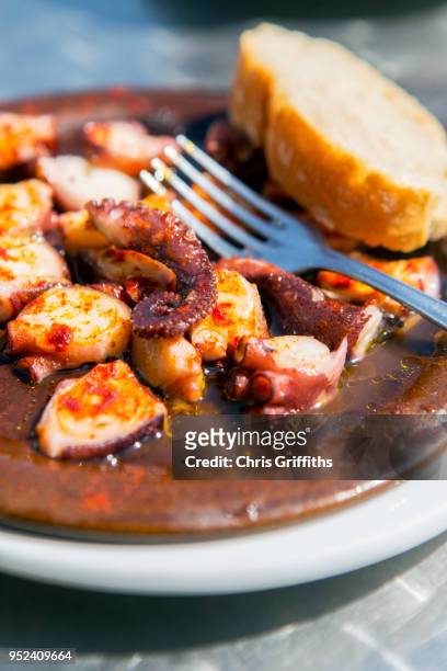 polbo a feira (galician style octopus) - feira stock pictures, royalty-free photos & images