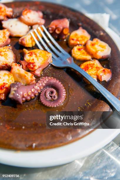 polbo a feira (galician style octopus) - feira stock pictures, royalty-free photos & images