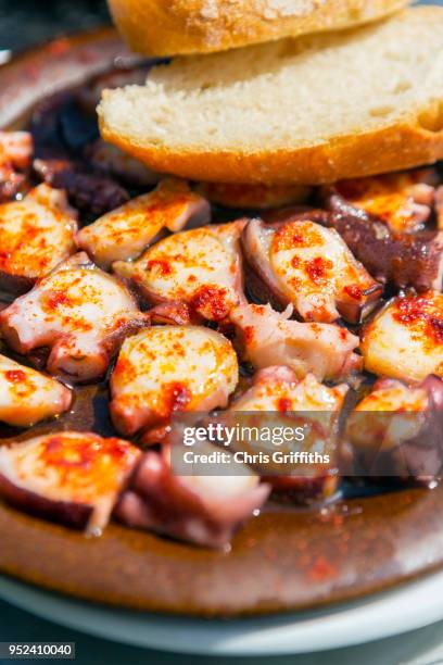 polbo a feira (galician style octopus) - feira stock pictures, royalty-free photos & images