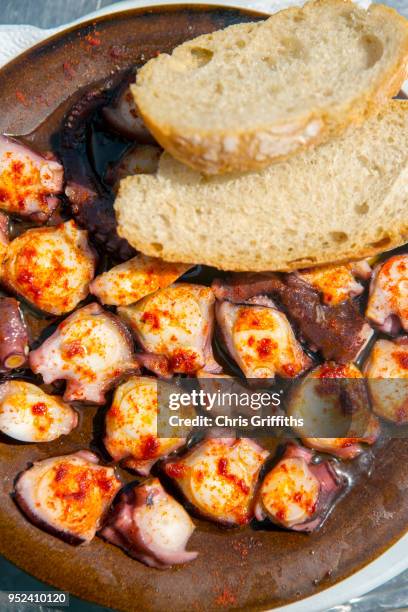 polbo a feira (galician style octopus) - feira stock pictures, royalty-free photos & images