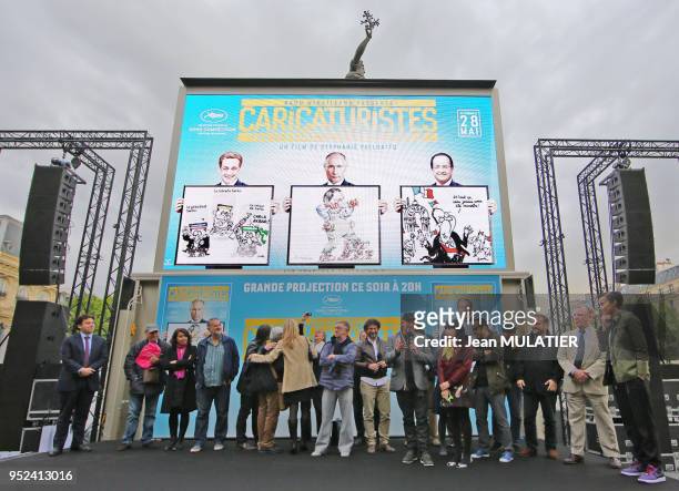 Projection en avant-première et en plein air sur la Place de la République du film 'Caricaturistes ? Fantassins de la démocratie' réalisé par...
