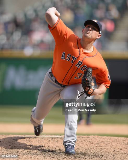 Will Harris of the Houston Astros pitches against the Chicago White Sox on April 22, 2018 at Guaranteed Rate Field in Chicago, Illinois. Will Harris