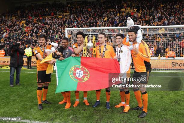 Players celebrate winning the Sky Bet Championship after the Sky Bet Championship match between Wolverhampton Wanderers and Sheffield Wednesday at...