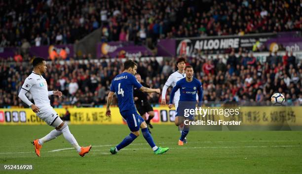 Cesc Fabregas of Chelsea scores his sides first goal during the Premier League match between Swansea City and Chelsea at Liberty Stadium on April 28,...