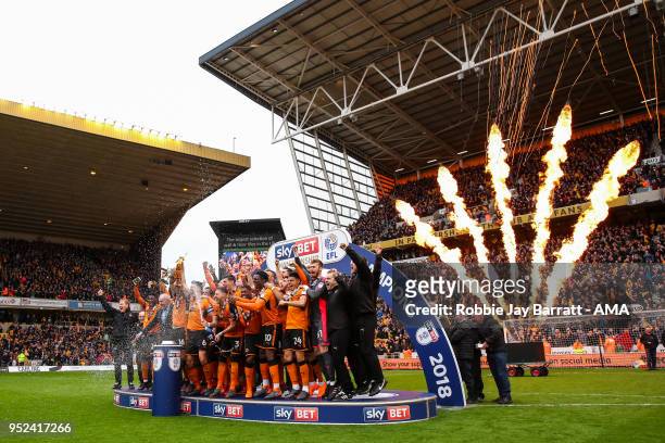 Wolverhampton Wanderers players celebrate winning the EFL Sky Bet Championship during the Sky Bet Championship match between Wolverhampton Wanderers...