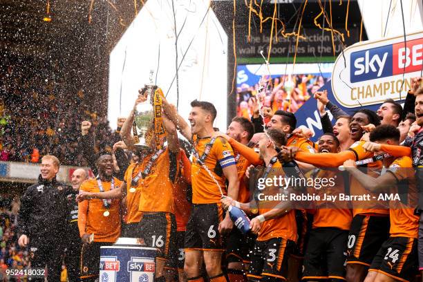 Wolverhampton Wanderers players celebrate winning the EFL Sky Bet Championship during the Sky Bet Championship match between Wolverhampton Wanderers...