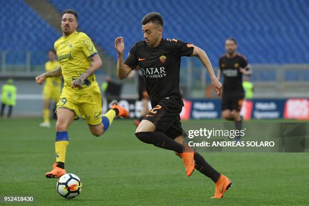 Roma's Italian striker Stephan El Shaarawy runs with the ball during the Italian Serie A football match between Roma and Chievo, on April 28, 2018 at...