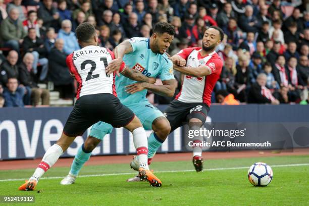 Ryan Bertrand of Southampton and Nathan Redmond of Southampton block Joshua King of Bournemouth path during the Premier League match between...