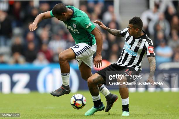 Salomon Rondon of West Bromwich Albion and Robert Kenedy of Newcastle United during the Premier League match between Newcastle United and West...