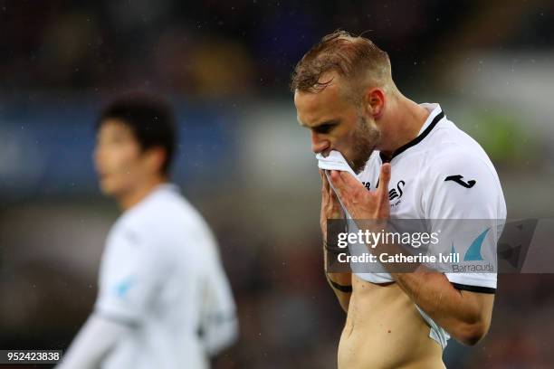 Mike van der Hoorn of Swansea City looks dejected during the Premier League match between Swansea City and Chelsea at Liberty Stadium on April 28,...