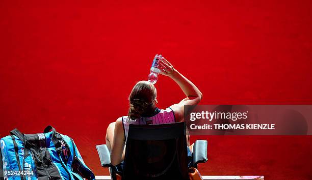 Czech Karolina Pliskova takes a refreshment during a break as she plays against Estonian Anett Kontaveit during their semifinal match at the WTA...