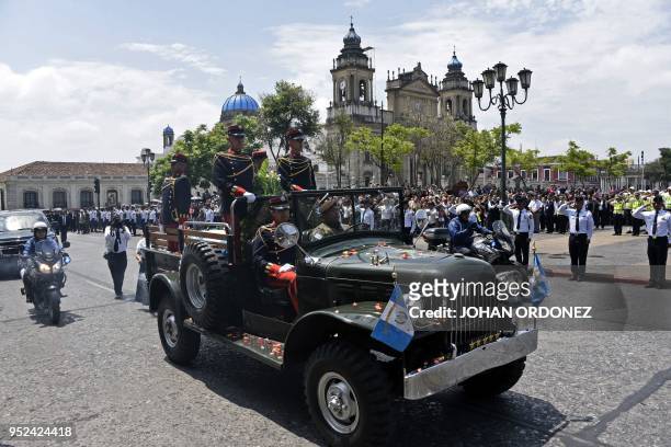 Military personnel arrive with the coffin of former Guatemalan President and Guatemala City Mayor, Alvaro Arzu, during his funeral at Culture Palace...