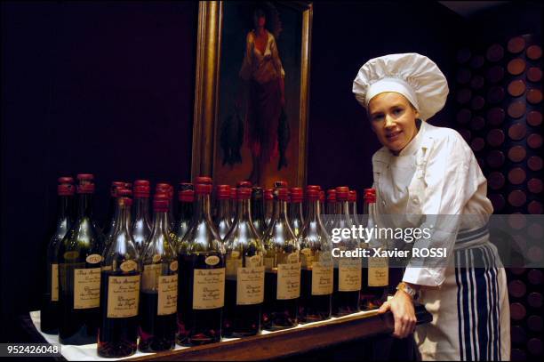 In her restaurant ont he rue d'Assas with the Armagnac collection of the family. The oldest bottles are at least 100 years old. A unique collection.