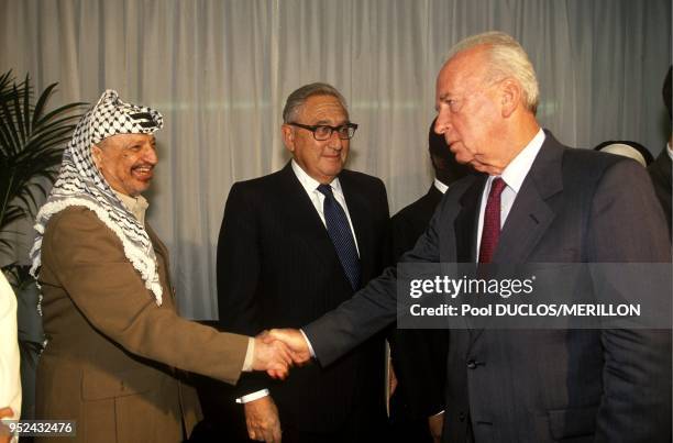 Yasser Arafat, Henry Kissinger and Yitzhak Rabin at UNESCO Headquarters in Paris, 6th July 1994. Palestine Liberation Organization Chairman Arafat,...