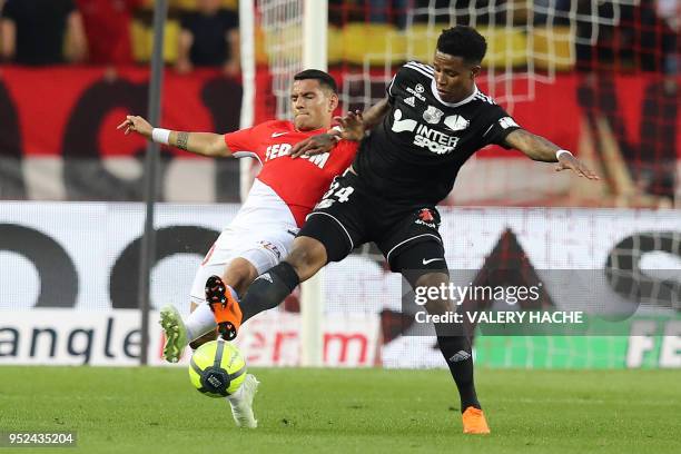 Monaco's Brazilian - Portuguese midfielder Rony Lopes vies with Amiens' South African midfielder Bongani Zungu during the French L1 football match...