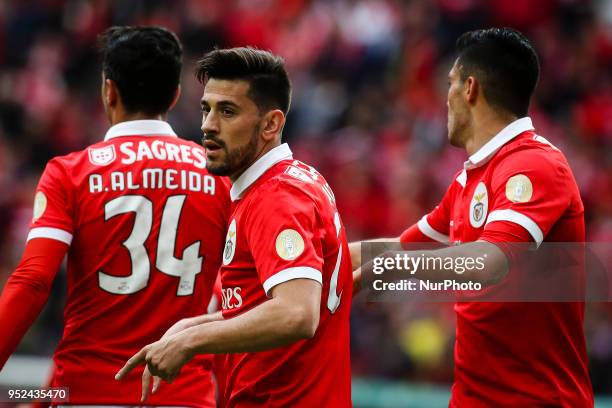 Benfica's forward Pizzi celebrates a goal with team mates during the Portuguese League football match between SL Benfica and Tondela at Luz Stadium...