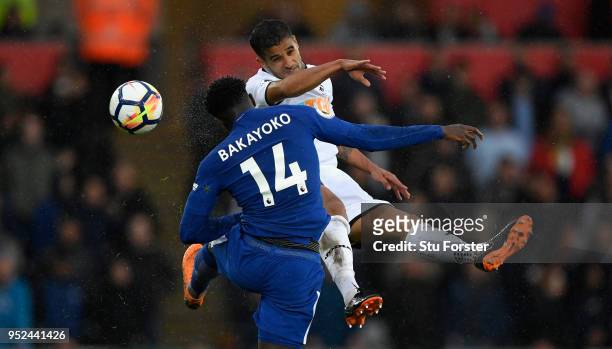 Kyle Naughton of Swansea City and Tiemoue Bakayoko of Chelsea battle for the ball during the Premier League match between Swansea City and Chelsea at...