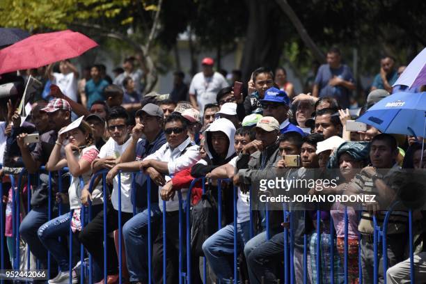 Guatemalans attend to the funeral of former Guatemalan President and Guatemala City Mayor, Alvaro Arzu, at Culture Palace in Guatemala City on April...