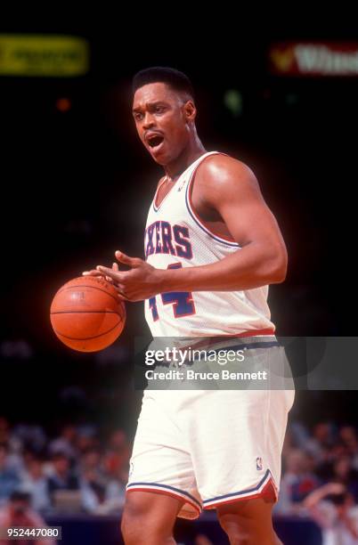 Rick Mahorn of the Philadelphia 76ers dribbles the ball during an NBA game circa April, 1991 at the Spectrum in Philadelphia, Pennsylvania.