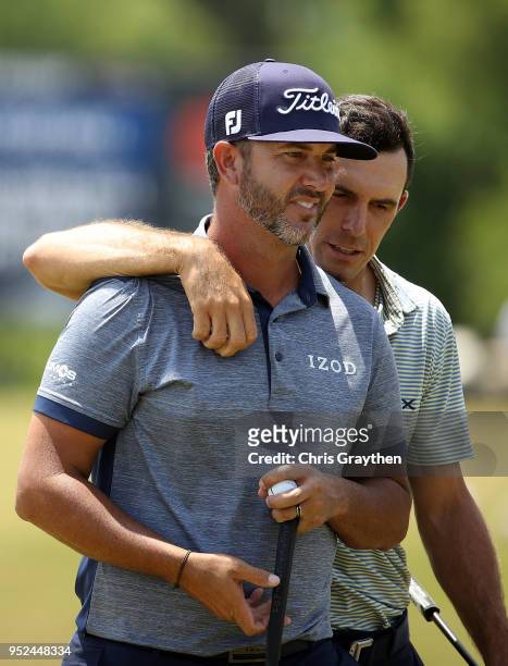 Billy Horschel and Scott Piercy react to thier putts on the 18th hole during the third round of the Zurich Classic at TPC Louisiana on April 28, 2018...