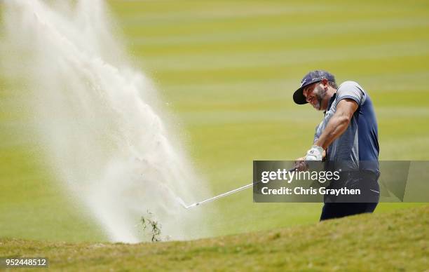 Scott Piercy plays a shot from a bunker on the 18th hole during the third round of the Zurich Classic at TPC Louisiana on April 28, 2018 in Avondale,...