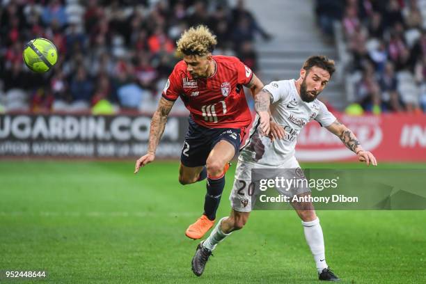 Kevin Malcuit of Lille and Julian Palmieri of Metz during the Ligue 1 match between Lille OSC and Metz at Stade Pierre Mauroy on April 28, 2018 in...