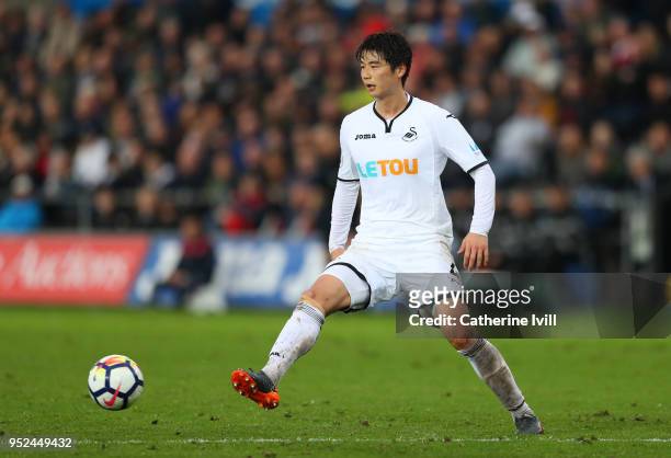 Ki Sung-Yueng of Swansea City during the Premier League match between Swansea City and Chelsea at Liberty Stadium on April 28, 2018 in Swansea, Wales.