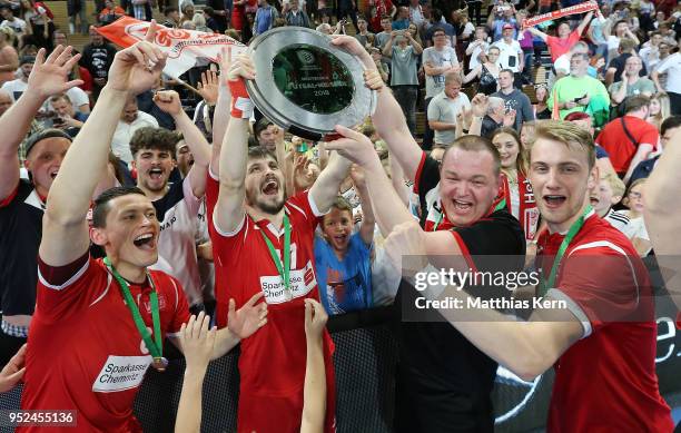 The players of Hohenstein Ernstthal celebrate with the trophy after winning the German Futsal Championship final match between VfL...