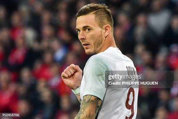 Metz's French forward Nolan Roux celebrates after scoring a goal during the French L1 football match between Lille and Metz on April 28 2018 at the...