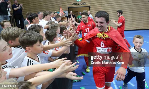 Durim Elezi of Hohenstein Ernstthal celebrates with his supporters after winning the German Futsal Championship final match between VfL...