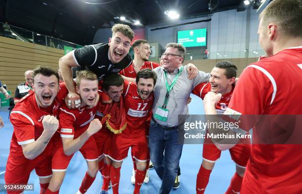 The players of Hohenstein Ernstthal celebrate after winning the German Futsal Championship final match between VfL Hohenstein-Ernstthal and Futsal...