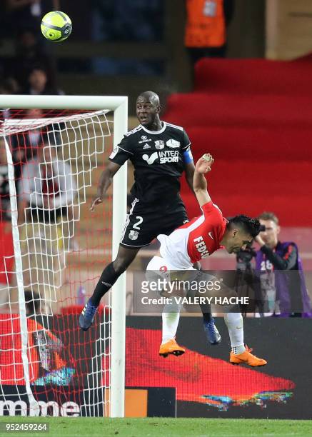 Monaco's Colombian forward Radamel Falcao vies with Amiens' Prince Desir Gouano during the French L1 football match Monaco vs Amiens on April 28,...