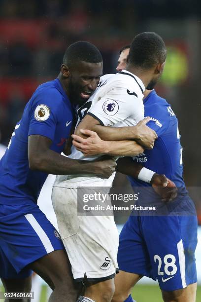 Gary Cahill of Chelsea confronts Jordan Ayew of Swansea City during the Premier League match between Swansea City and Chelsea at the Liberty Stadium...