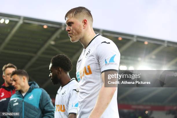 Alfie Mawson of Swansea City after the final whistle of the Premier League match between Swansea City and Chelsea at the Liberty Stadium on April 28,...