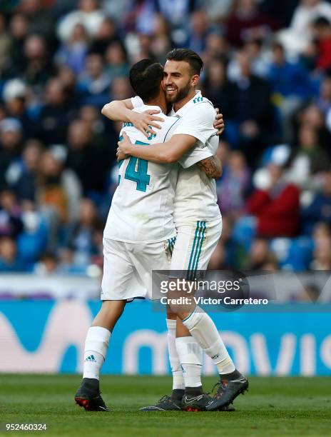 Borja Mayoral of Real Madrid celebrates with teammate Daniel Ceballos after scoring his team's second goal during the La Liga match between Real...