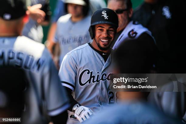 Leury Garcia of the Chicago White Sox smiles after scoring a run against the Kansas City Royals during the fourth inning of game one of a...