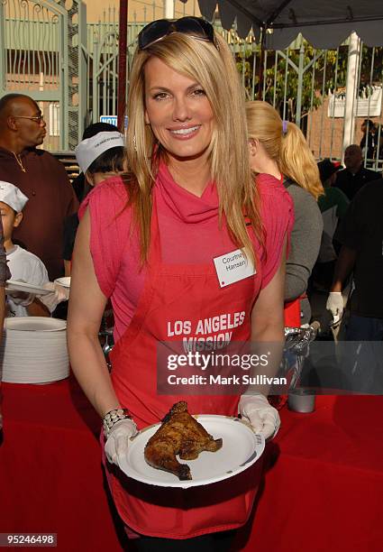 Actress Courtney Hansen volunteers at the Los Angeles Mission Christmas Eve meal on December 24, 2009 in Los Angeles, California.