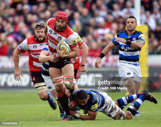 Gloucester's Mariano Galarza is tackled by Bath Rugby's Taulupe Faletau during the Aviva Premiership match between Gloucester Rugby and Bath Rugby at...