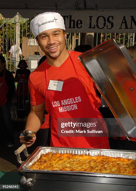 Actor Corbin Bleu volunteers at the Los Angeles Mission Christmas Eve meal on December 24, 2009 in Los Angeles, California.