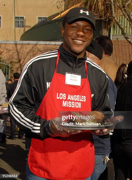 Actor Edwin Hodge volunteers at the Los Angeles Mission Christmas Eve meal on December 24, 2009 in Los Angeles, California.