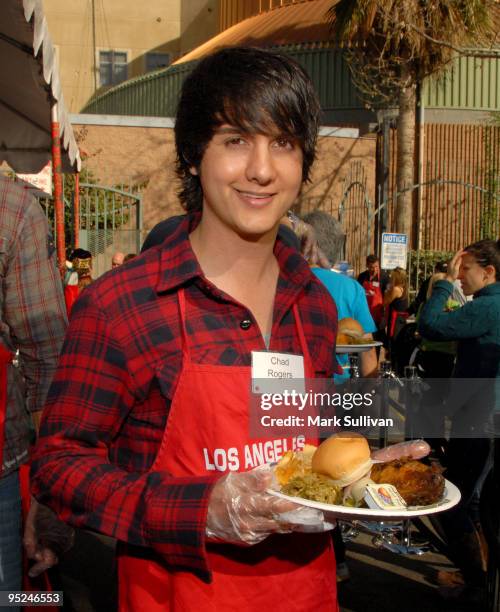 Television personality Chad Rogers volunteers at the Los Angeles Mission Christmas Eve meal on December 24, 2009 in Los Angeles, California.