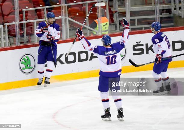 Brett Perlini of Great Britain celebrates his goal with Robert Farmer of Great Britain and Colin Shields of Great Britain during the 2018 IIHF Ice...