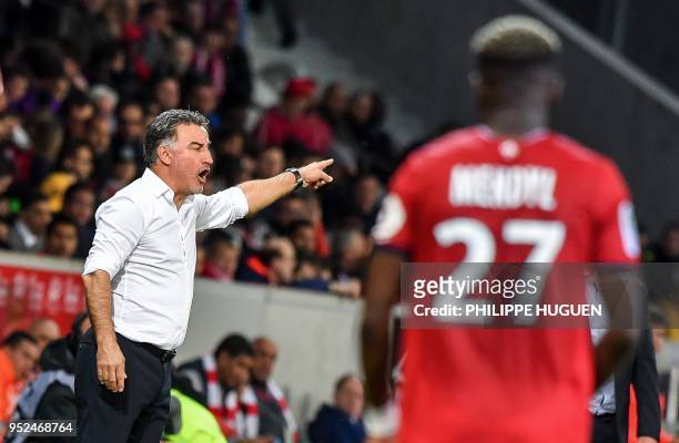 Lille's french head-coach Christophe Galtier gestures during the French L1 football match between Lille and Metz on April 28 2018 at the Pierre...
